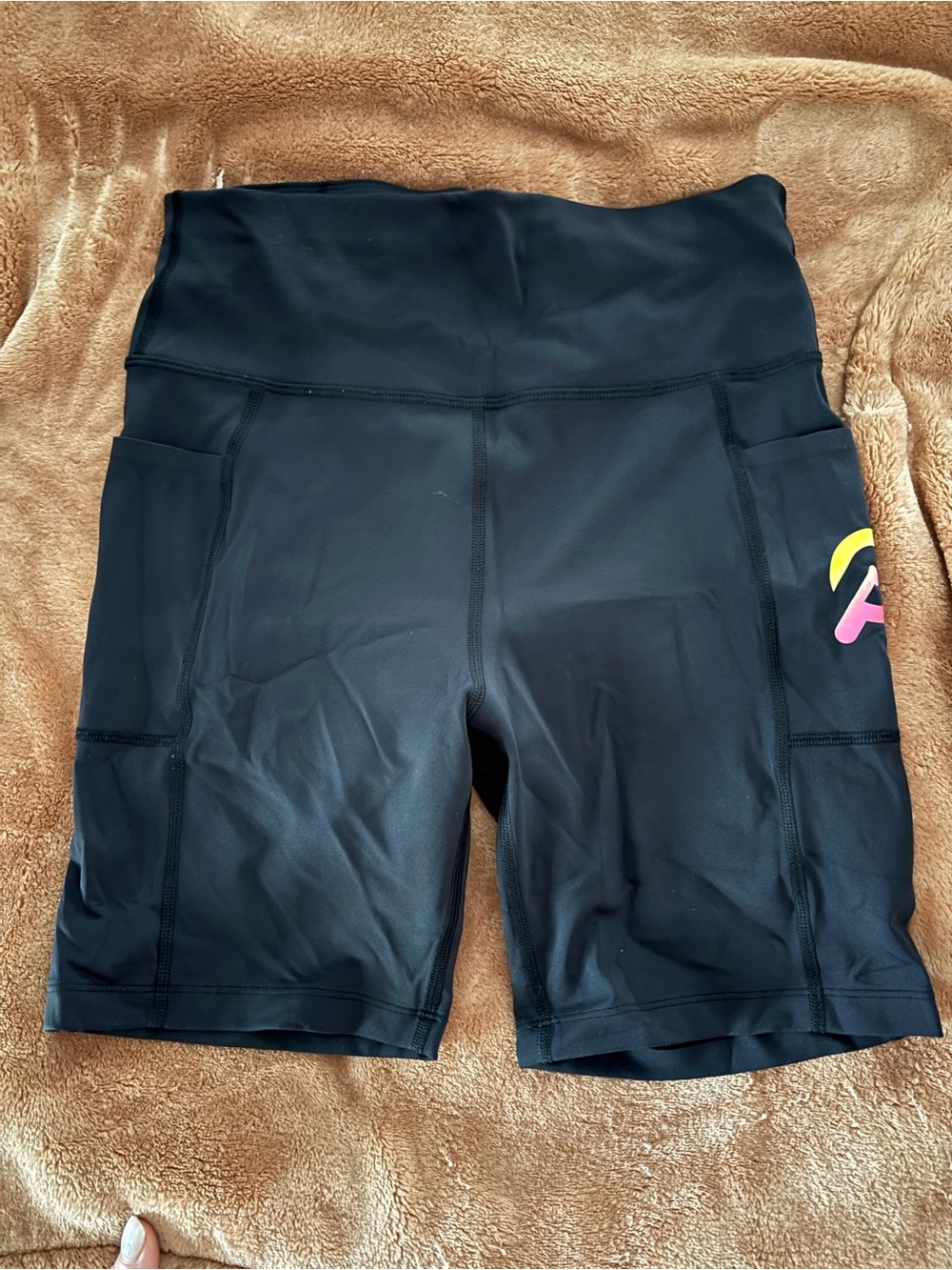 Peloton Black High-Rise Pocket Bike Shorts with Neon Accent